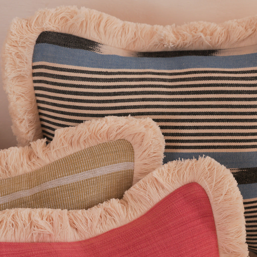 Cotton produced and woven in Burkina Faso, made into beautiful cushions for Storie.