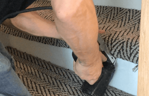 stapling the stair tread carpet