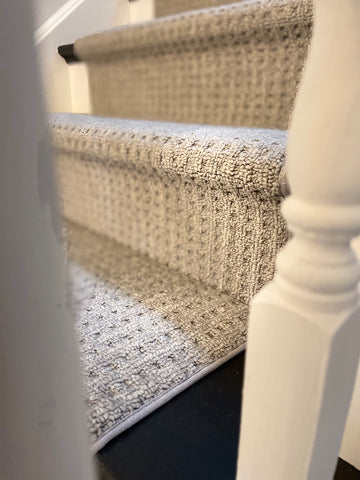gray staircase runner with pattern