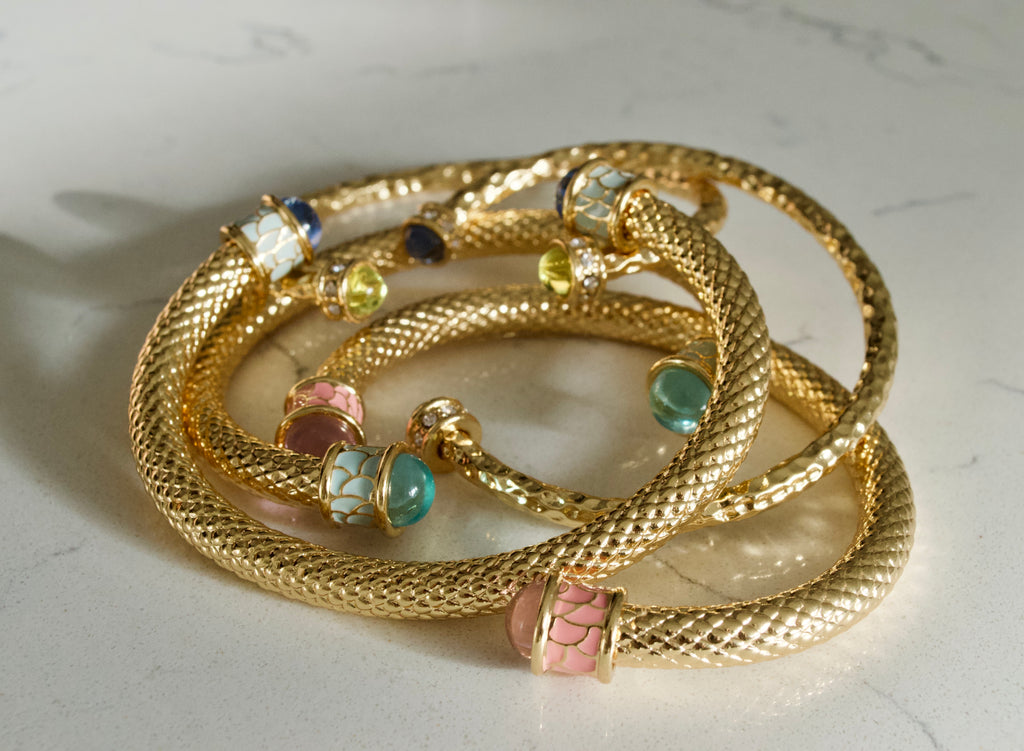 Image of Halcyon Days bangles lying on marble worktop