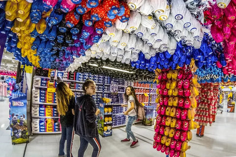 grocery store in Brazil with hundreds of chocolate eggs hanging from the ceiling.