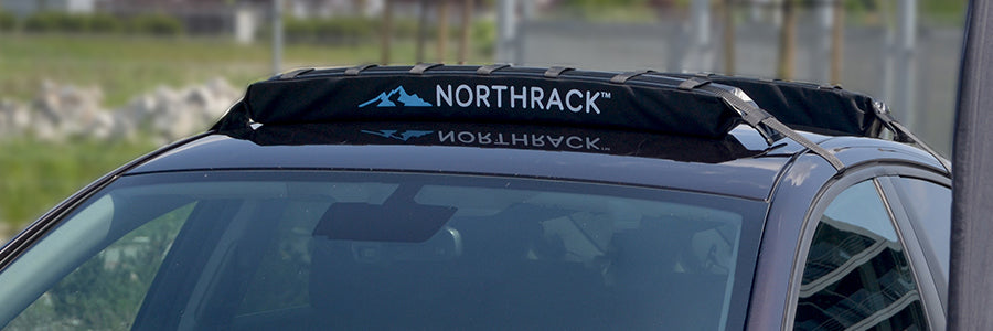 Frakta SUP på bilen med takräcket Northrack