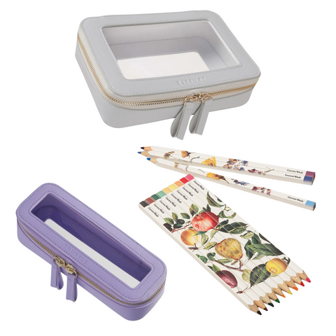 coloring supplies organized in the truffle large and mini jetset cases