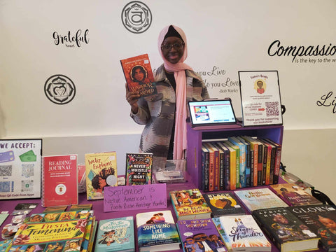 Tuma's Books Owner at Popup Event