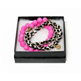 Pink bracelet with gold cones