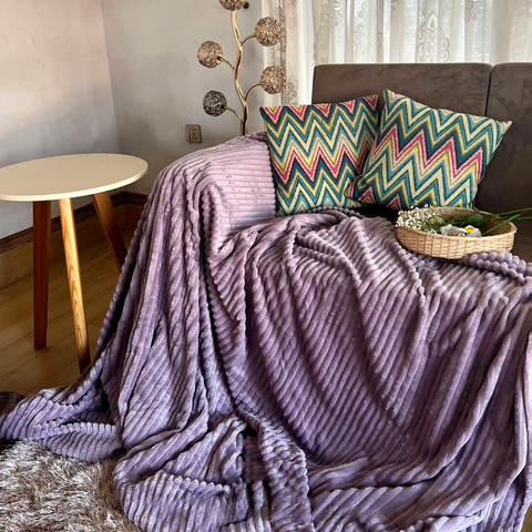 Striped plush blankets are the perfect way to accessorize your homes