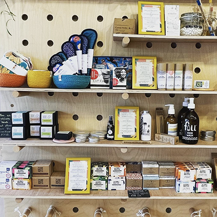 pegboard shelves with various zero waste products on