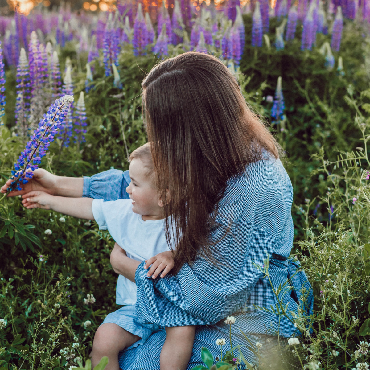 mom and baby picking lavender