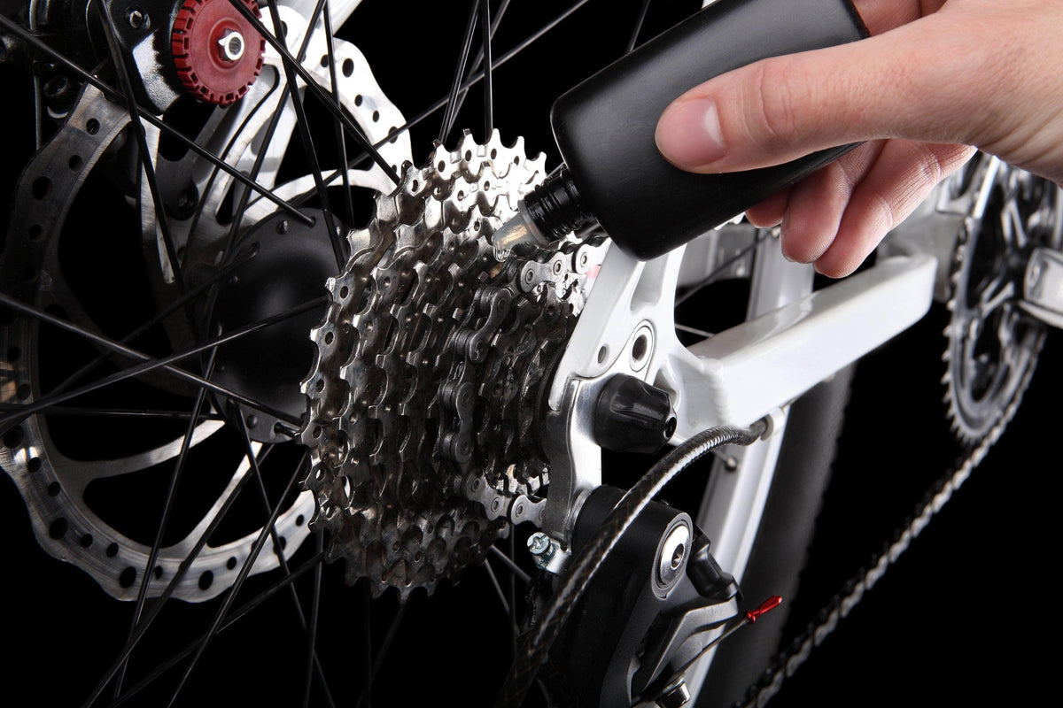 greasing bike chain