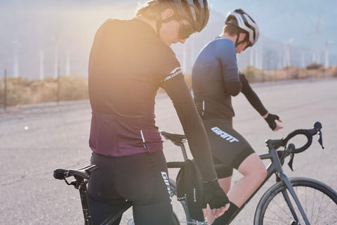 Road cyclists getting ready to ride.