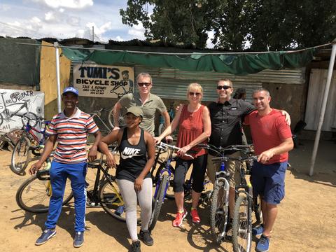 Ken, Mike's Bikes CEO, with Mike & Debbe, Bicycle Warehouse Owners