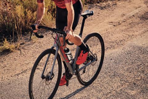 ROAD BIKER CLIMBING OUT OF THE SADDLE