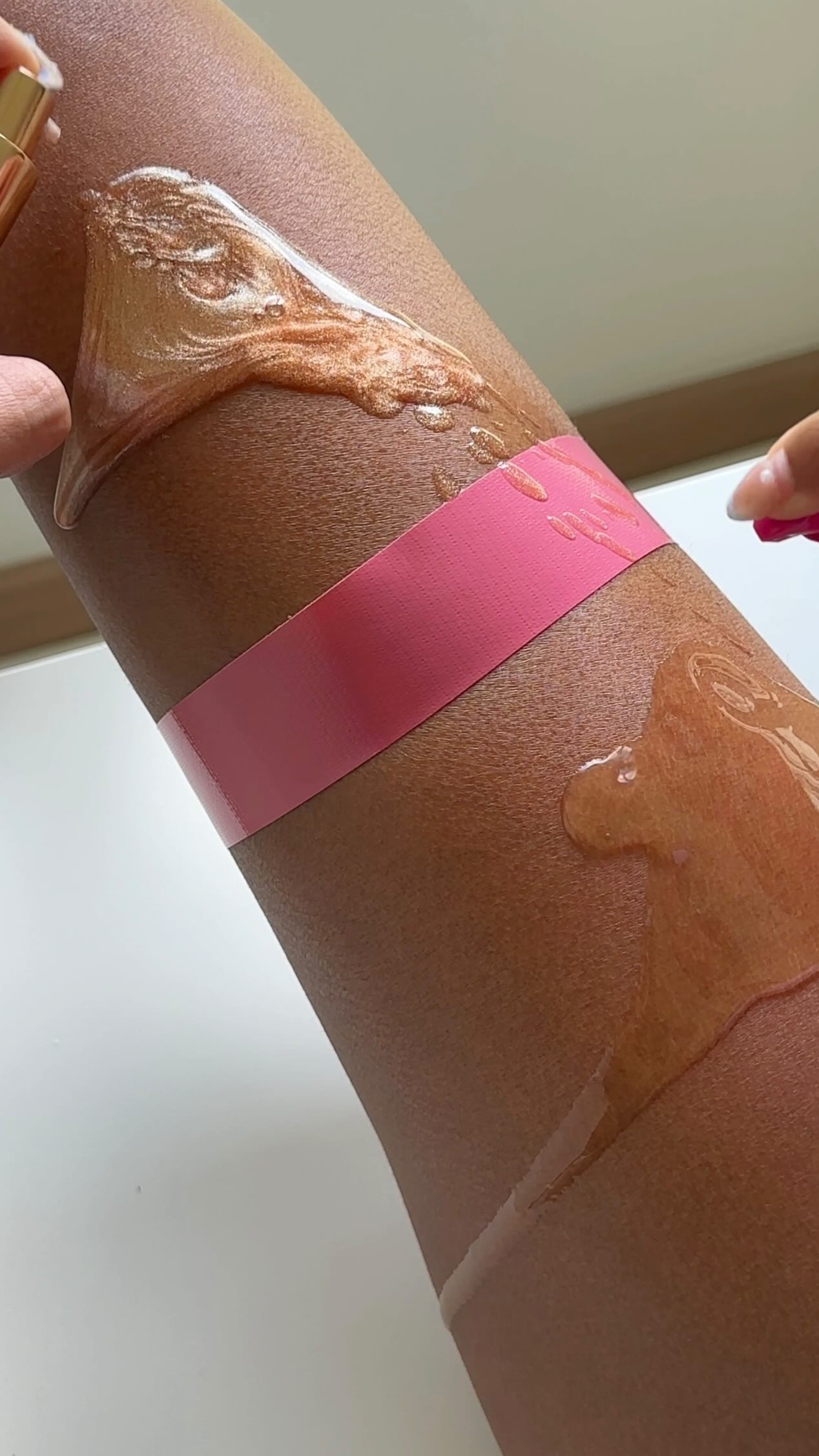 Model applying Coco & Eve tanning foam