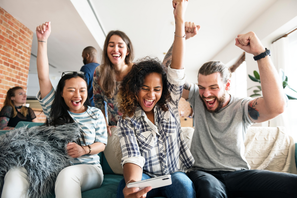 Group of friend excited on phone