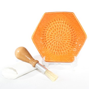 https://cdn.shopify.com/s/files/1/0286/1672/0466/products/The-Grate-Plate-Handmade-Ceramic-Grater-in-Orange_350x350.jpg?v=1596069171