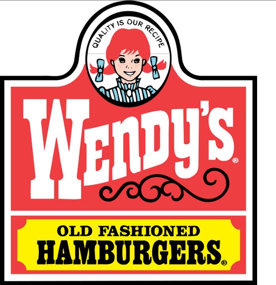 Bright Colors of Yellow, Orange, and Holographic in Branding: Yellow in Wendy's Logo