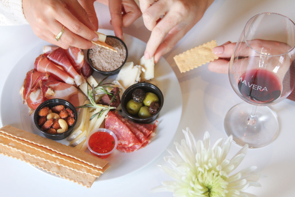 Enjoy a cheese and charcuterie plate at Croma Vera Wines while wine tasting in San Luis Obispo