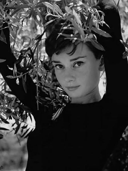 Audrey Hepburn with an olive tree