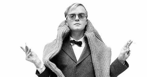 Truman Capote posing as a writer