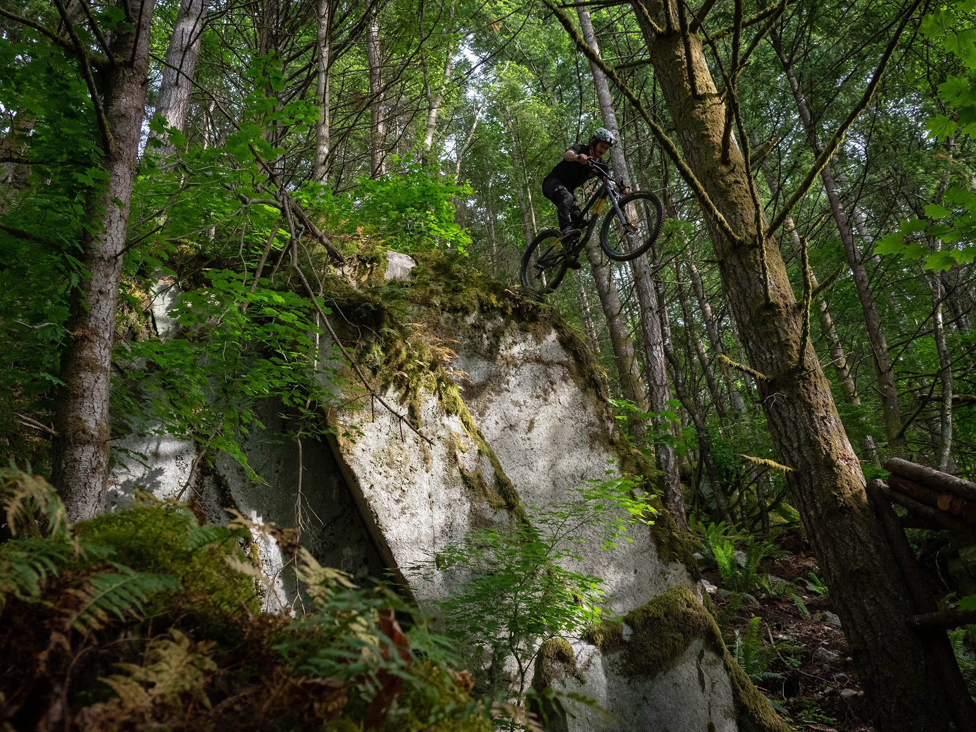 Yoann Barelli jumping his Guerrilla Gravity Gnarvana off of a rock.