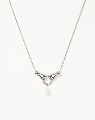 Elsa Peretti® Open Heart pendant in sterling silver and black jade. |  Tiffany & Co.