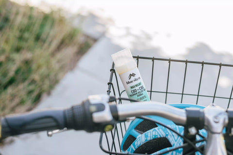 cbd plus cbg topical balm for pain relief in the bike basket