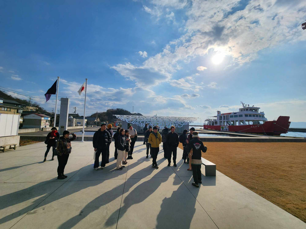 Graduate students from the University of Melbourne's Japan Studio architecture course learning about community spaces on Ogijima.