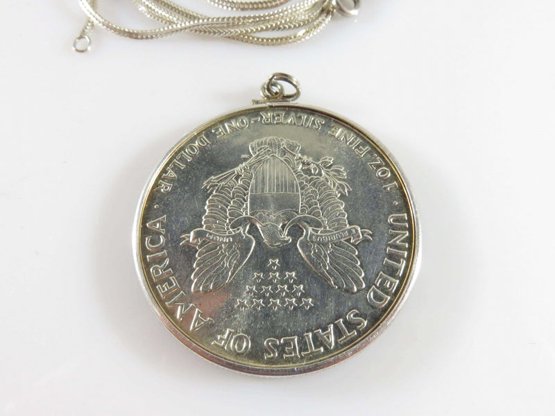 A .999 Fine 1988 American Eagle Silver Dollar 1oz Pendant with 30