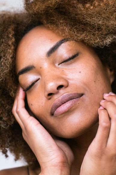  A woman’s face with moisturized skin