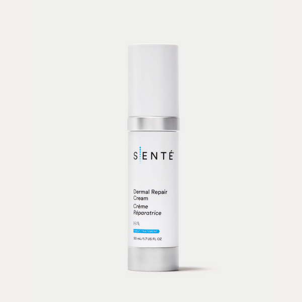 a bottle of Senté Dermal Repair Cream against a white backdrop