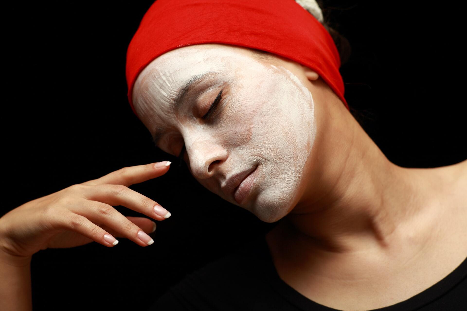 Woman has applied a skin mask to maintain her skin's health.