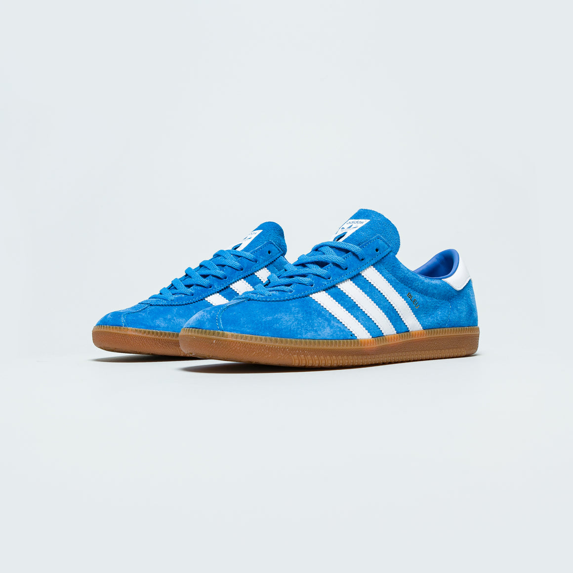 bright blue adidas trainers