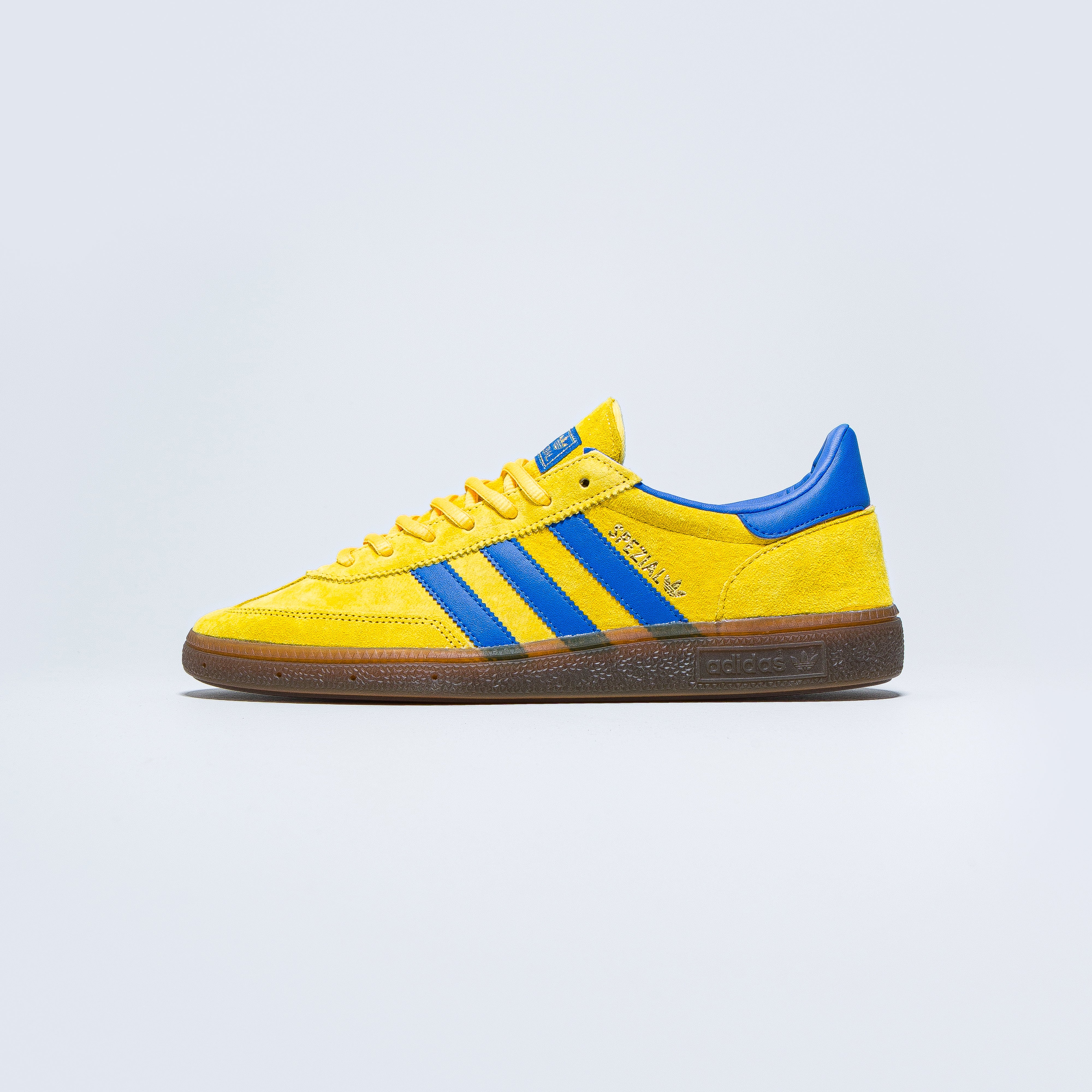 blue and yellow adidas spezial