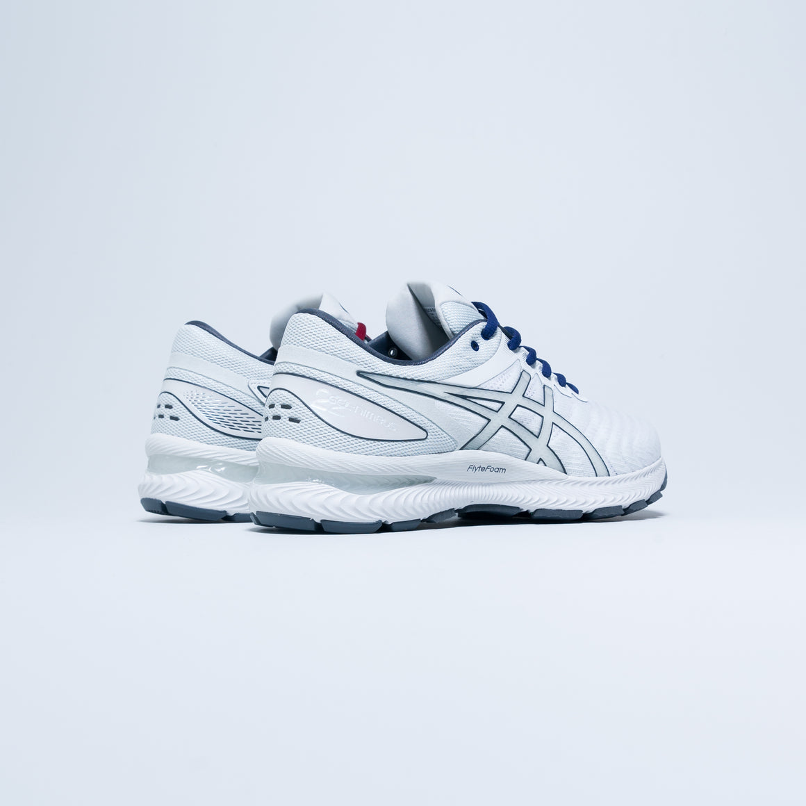 asics reigning champ grey