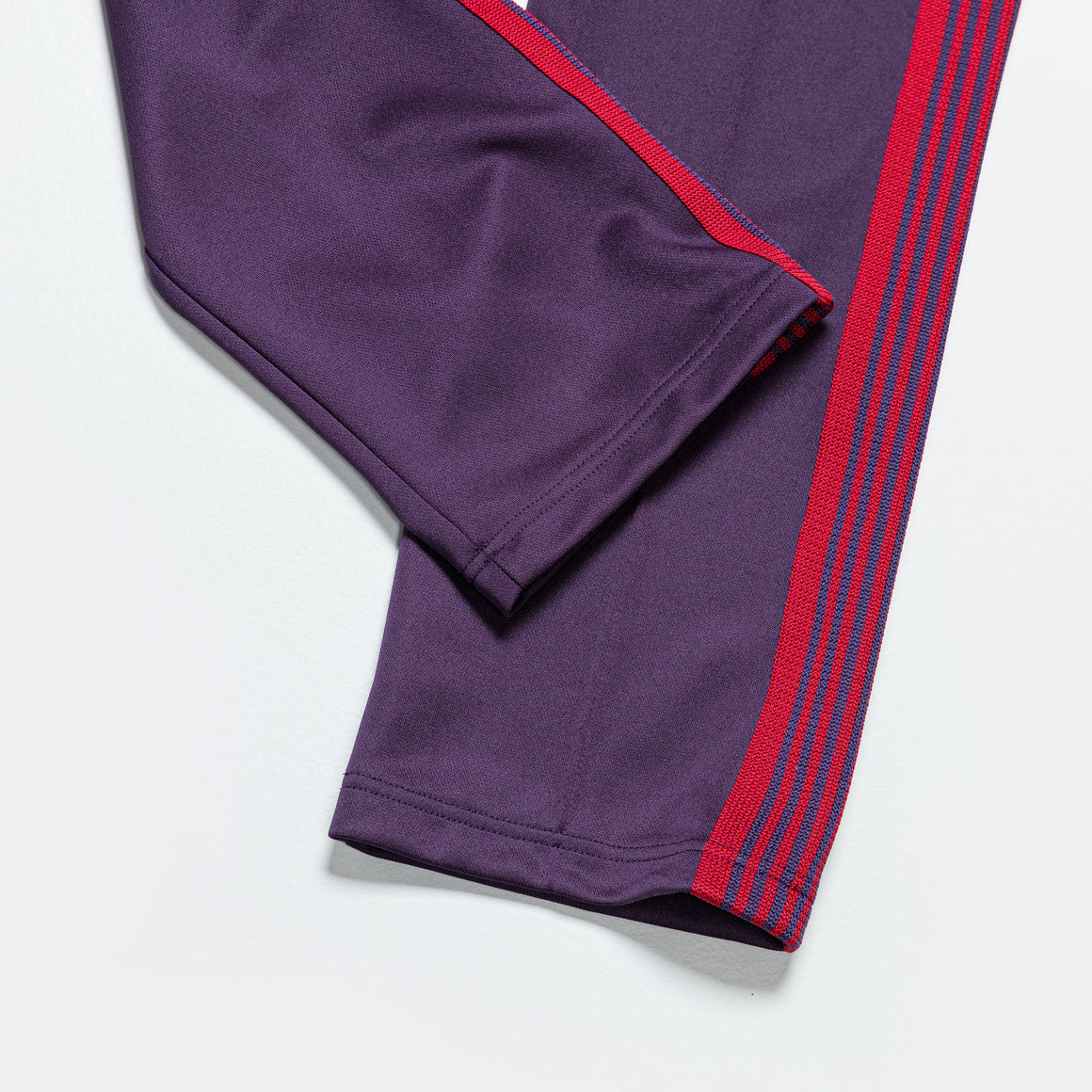 Needles Narrow Track Pant - Dk. Purple Poly Smooth | Up There Store