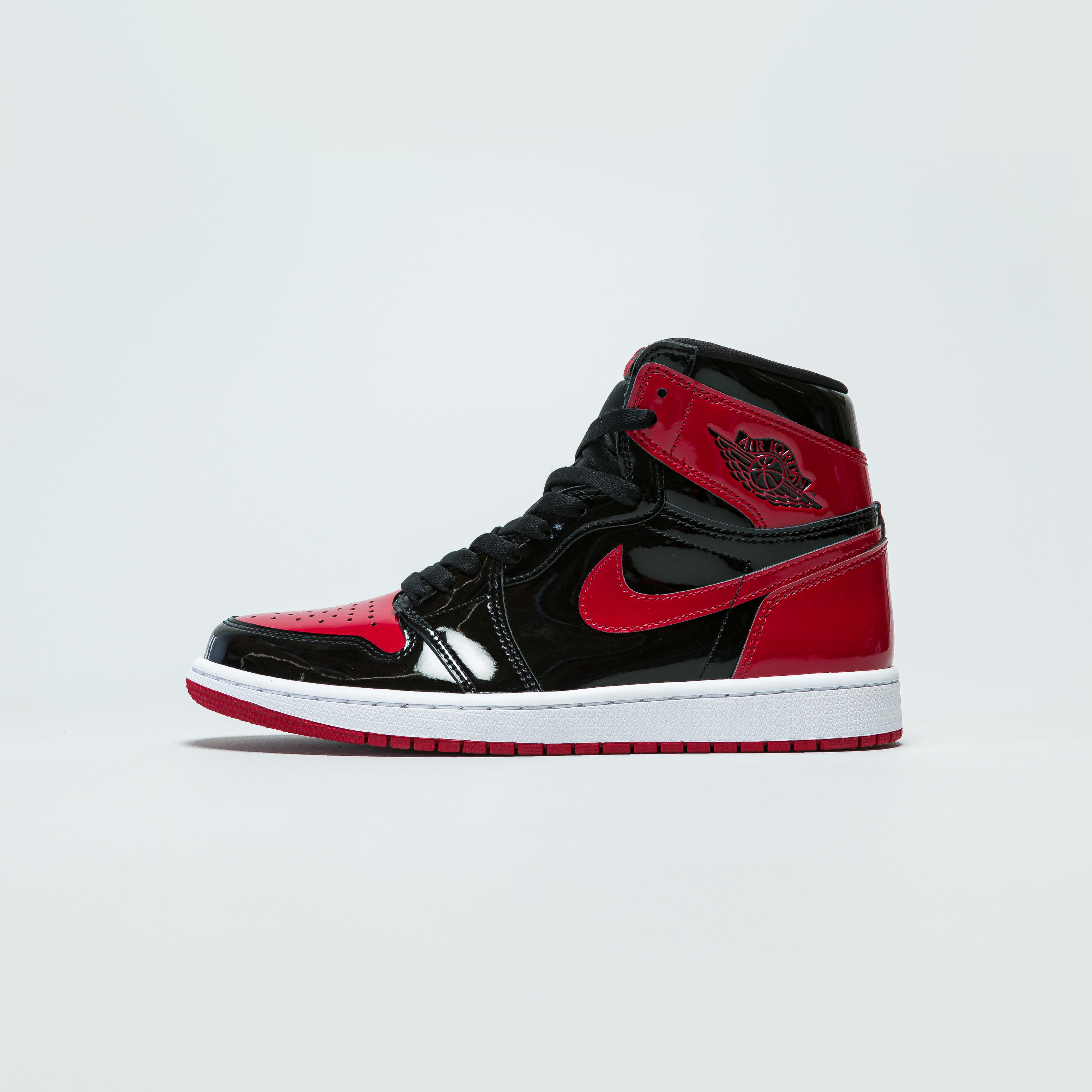 black white varsity red jordan 1