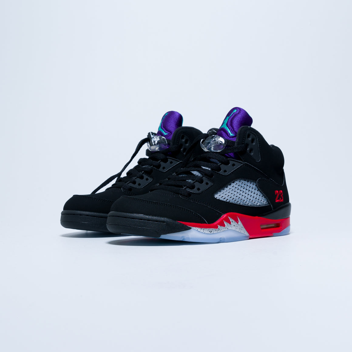 black new emerald fire red jordan 5