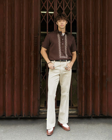 Brown Polo Barong with geometric embroidery. Available at Kultura (Php 1799.75)