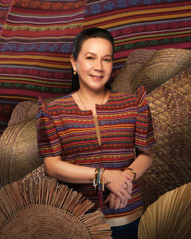 Senator Grace Poe wears a versatile terno bolero in an ethnic weave, accessorized with a champagne South Sea pearl choker and champagne South Sea pearl studs. 