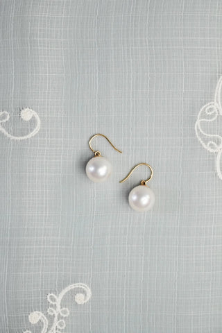 dangling pearl earrings