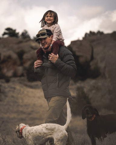 Fred Bohm with his daughter teaching hunting lessons