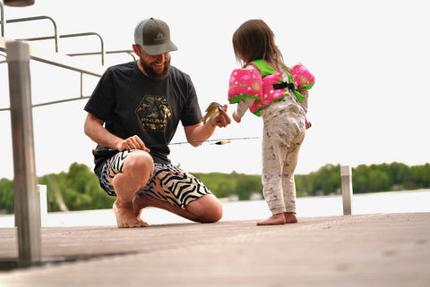 Mitch Pantzke fishing with his daughter in Pnuma