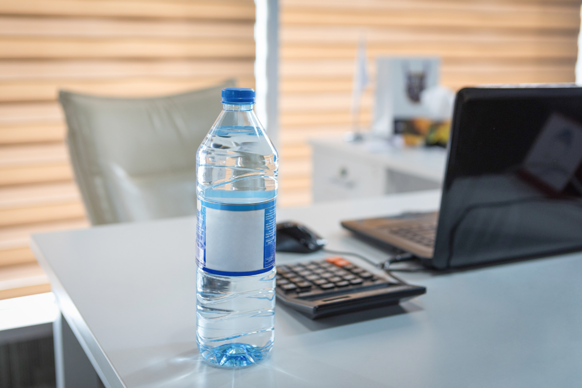 bottled water on a desk