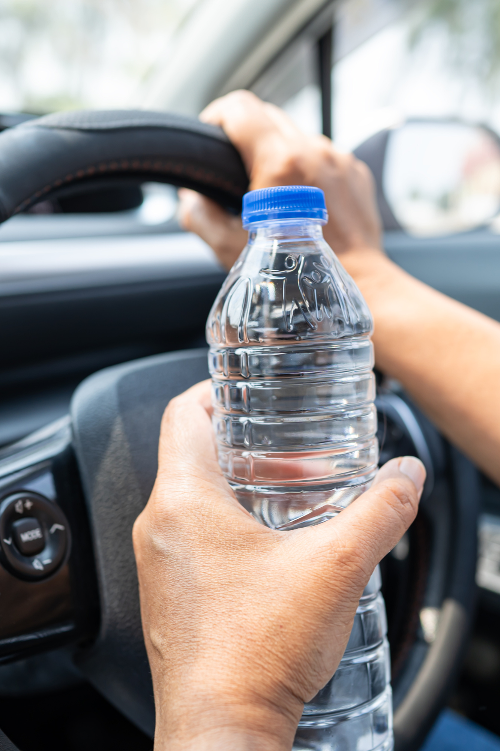 plastic water bottle in a car