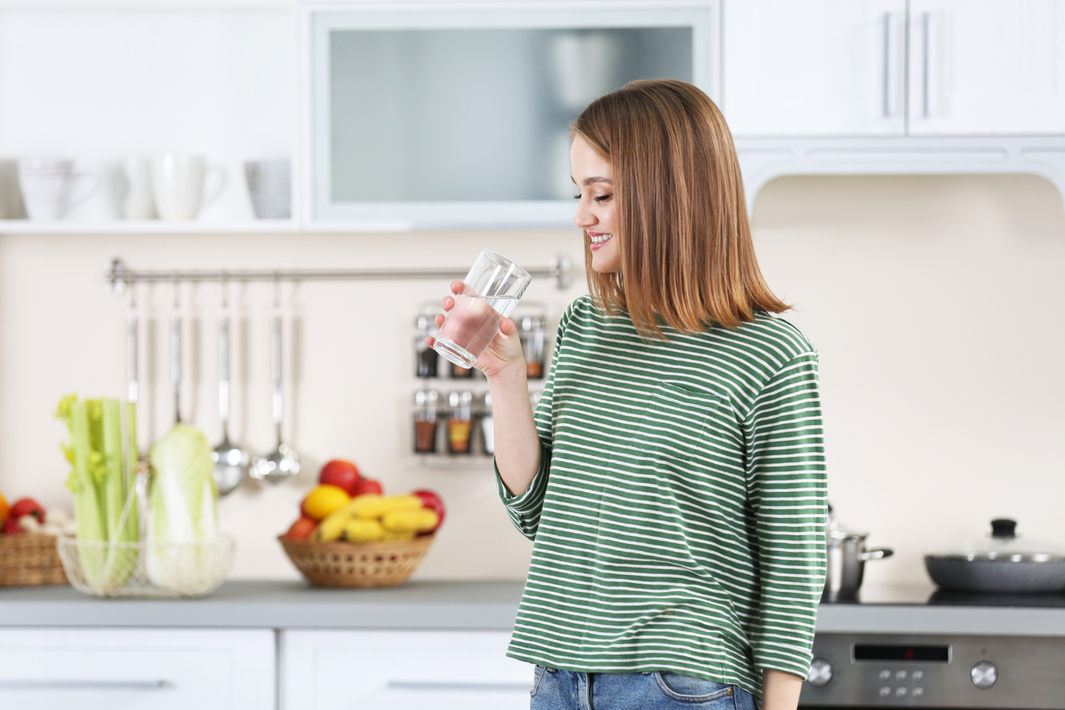 woman drinking glass of water