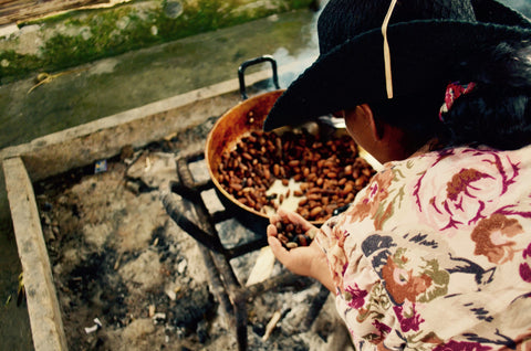 roasting beans over the fire