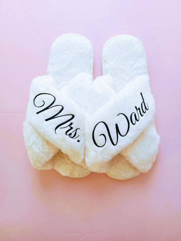 white personalized slippers for the bride to be, getting ready the morning of the wedding slippers