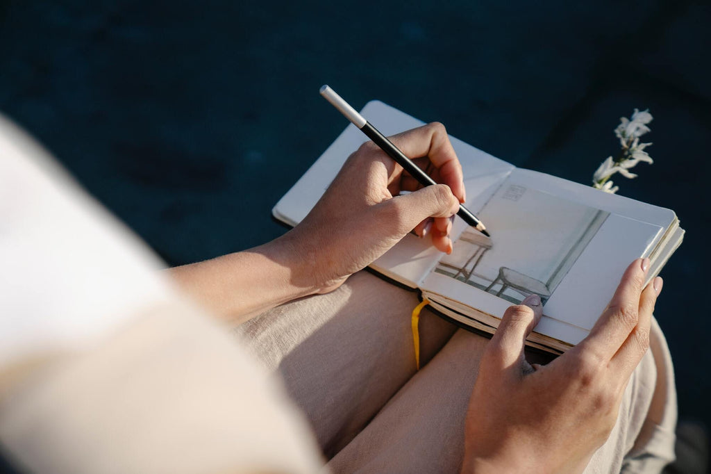 Woman taking notes in a notebook