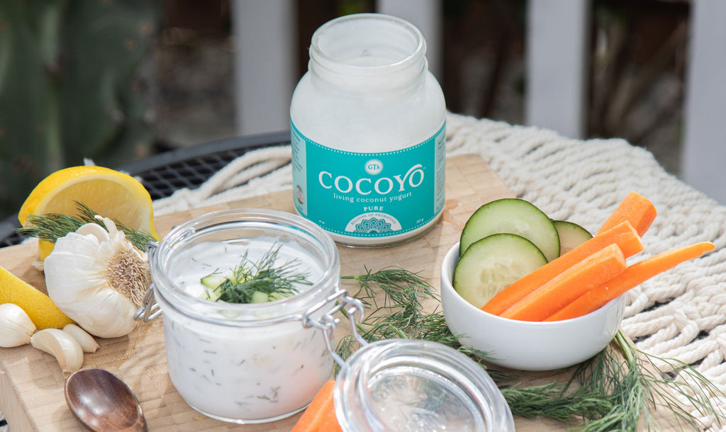 Closeup of vegetable spread and GT's Pure COCOYO Coconut Yogurt