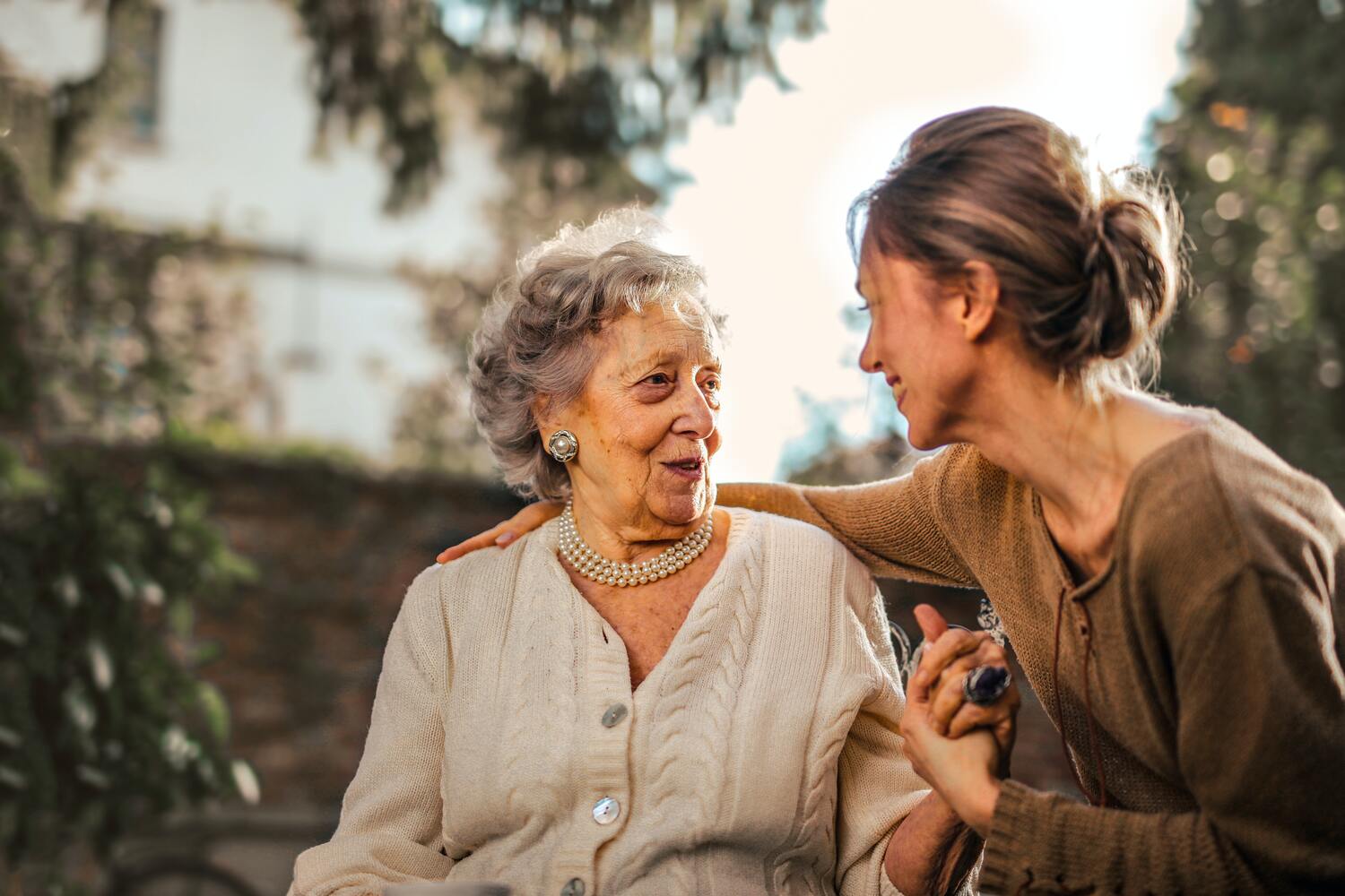 Two women talking supportively. 